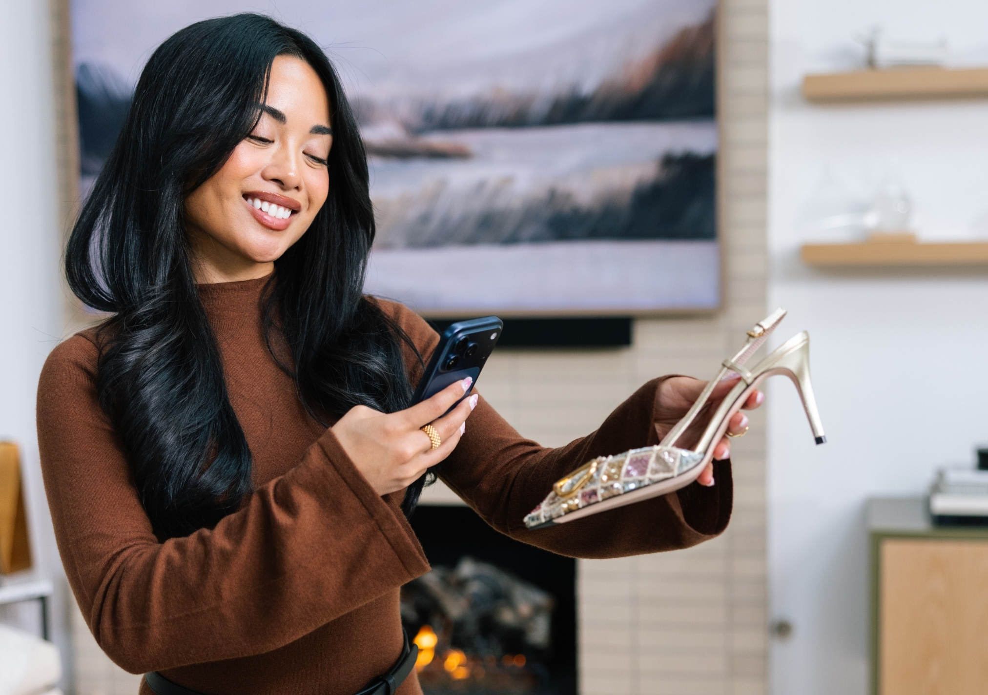 Woman verifying the authenticity of designer heels with Real Authentication